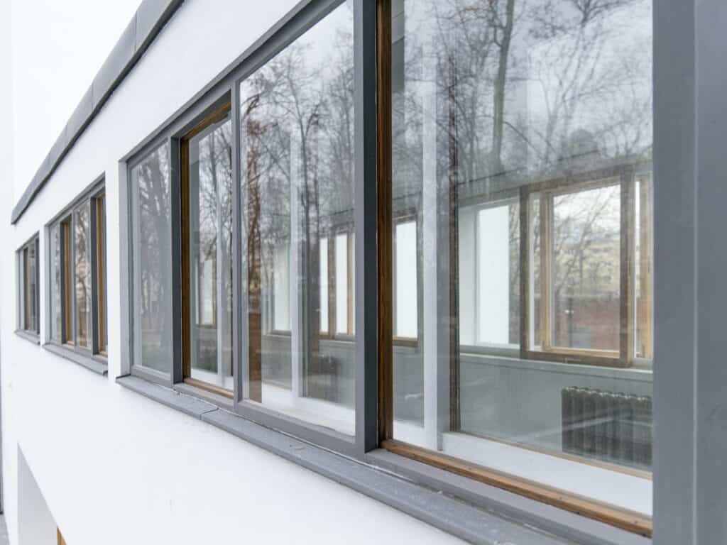Exterior view of a building with large windows, relevant to choosing energy efficient windows