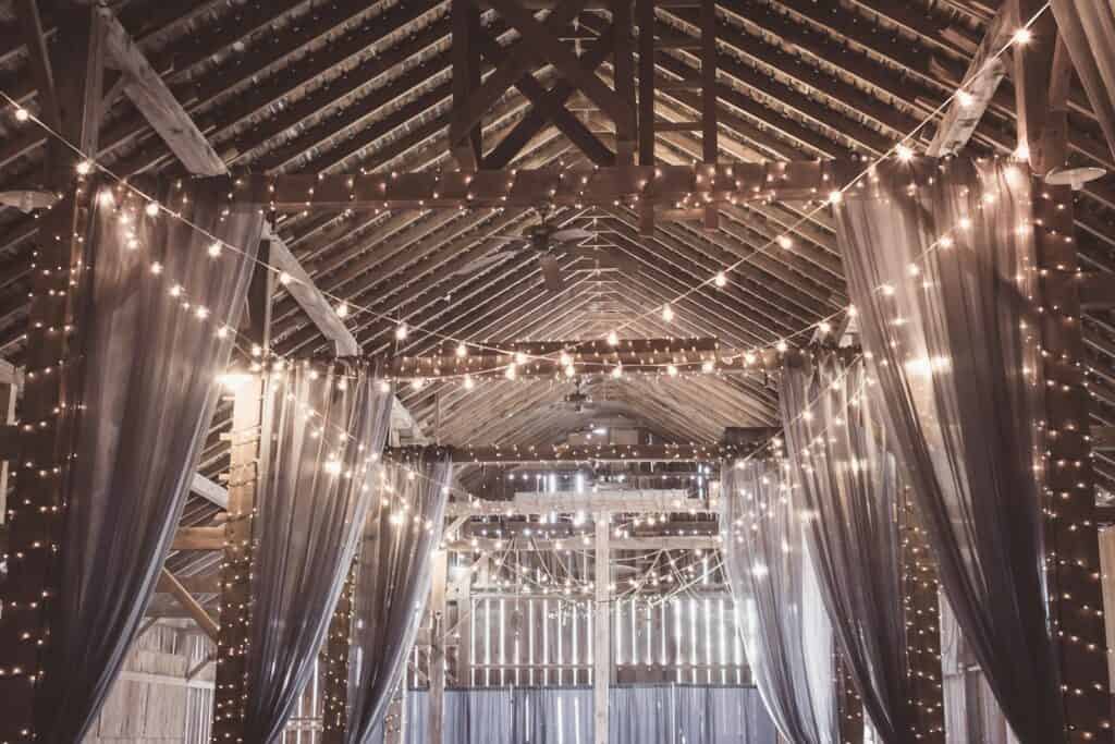 String lights in a gazebo at an old barn, a relaxed rustic setting for a second wedding